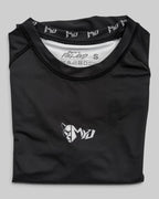 MYU Black rashguard, plain black short-sleeve no-gi BJJ compression top — folded front view