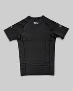 MYU Black rashguard, plain black short-sleeve no-gi BJJ compression top — back view