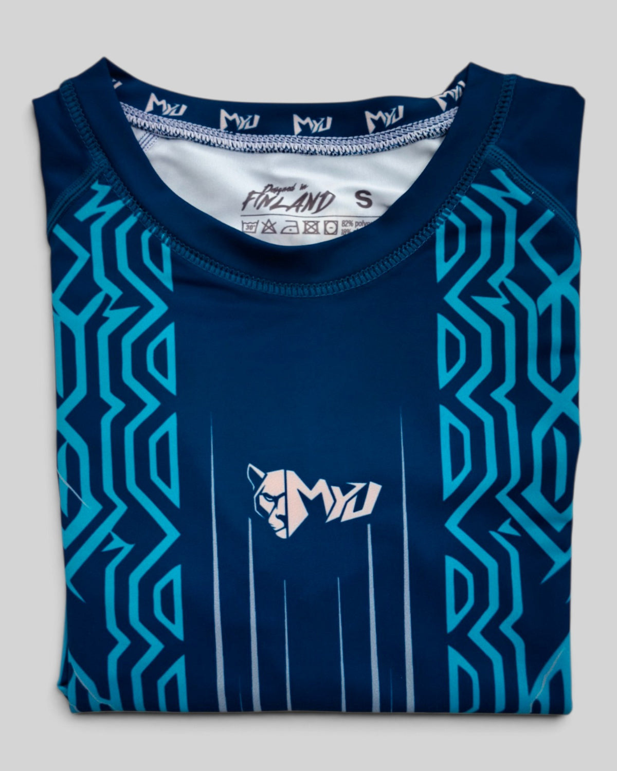 MYU Teal Circuit rashguard, teal short-sleeve BJJ top with circuit line print — back view