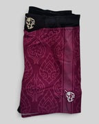 MYU Crimson Ornamental fight shorts, crimson grappling and MMA shorts with ornamental pattern — folded side angle
