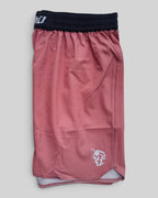 MYU Dusty Rose fight shorts, muted pink grappling and MMA shorts — folded side angle
