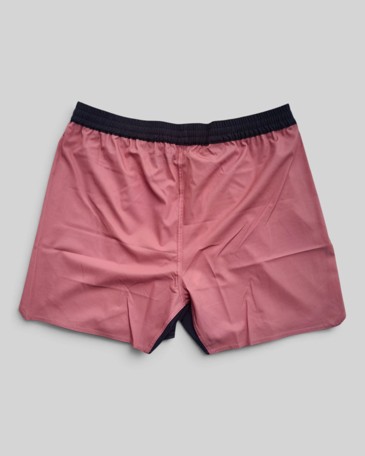 MYU Dusty Rose fight shorts, muted pink grappling and MMA shorts — back view