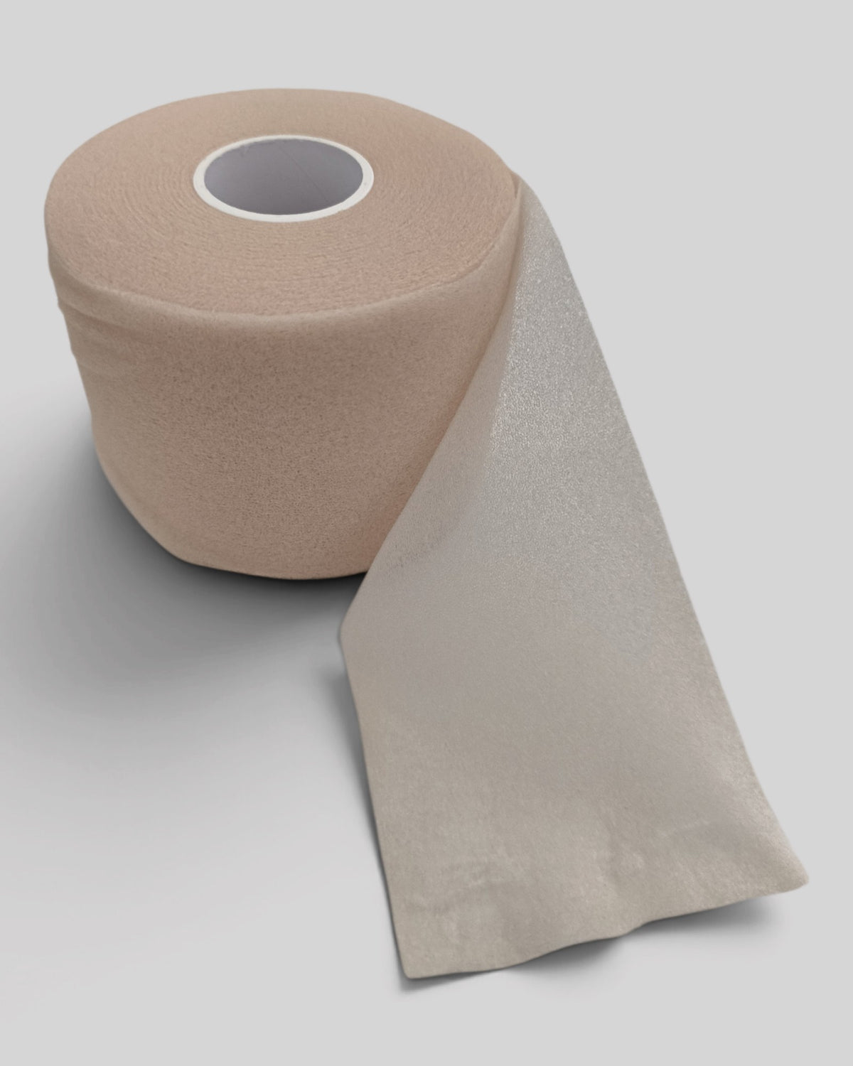 MYU foam underwrap roll used as a base layer under athletic tape — front view
