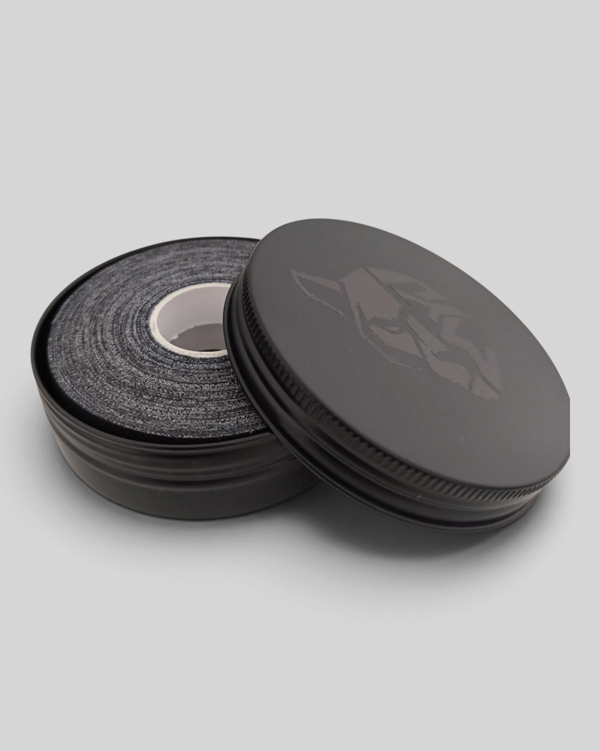 MYU finger tape rolls in a tin box, for BJJ and climbing grip support — front view