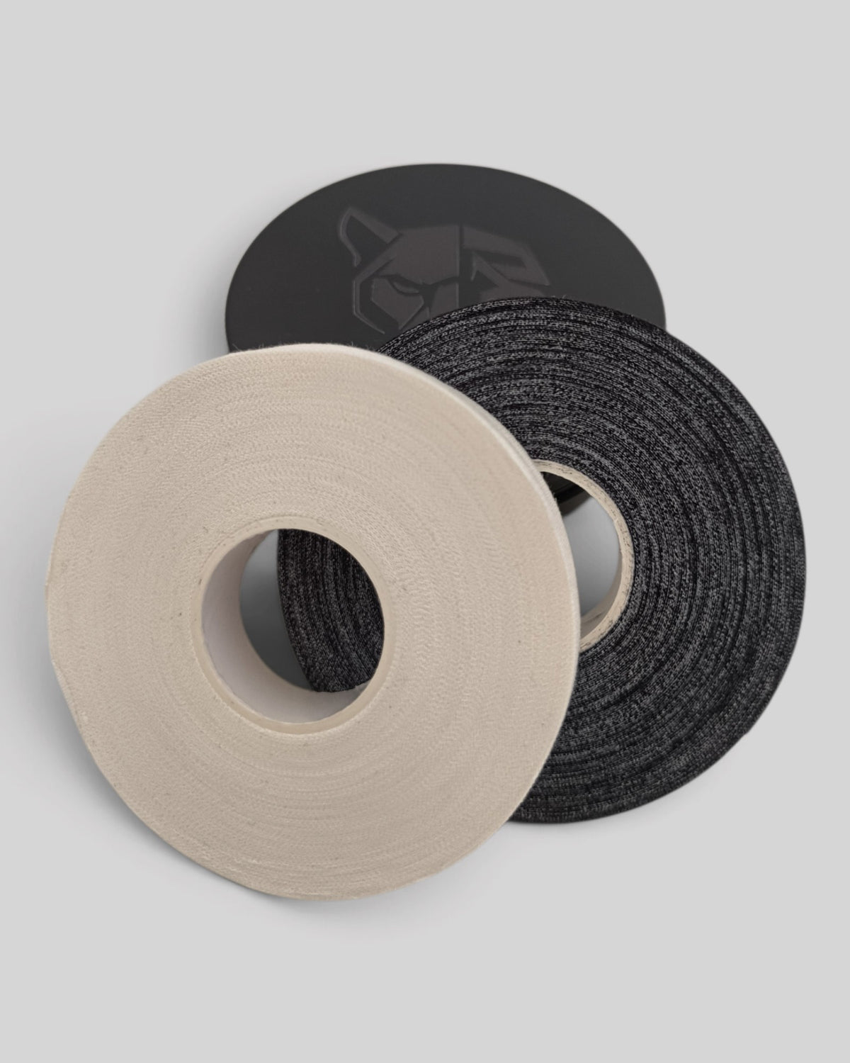 MYU finger tape rolls in a tin box, for BJJ and climbing grip support — second angle